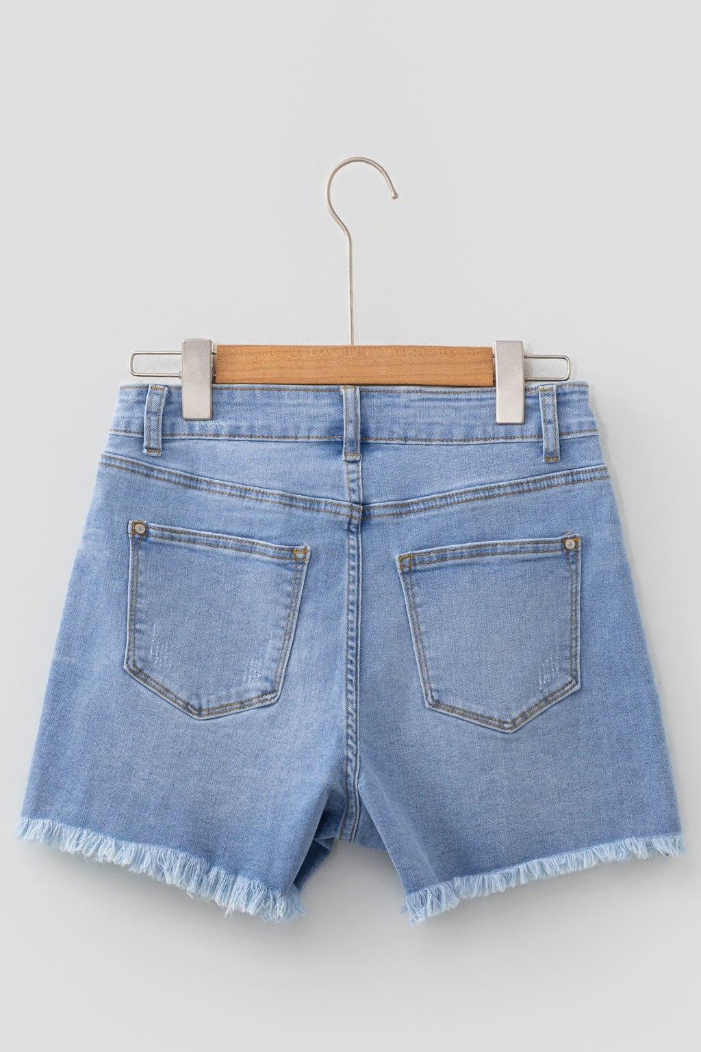 Sail Blue Asymmetric Raw Hem Distressed Whiskery Denim Shorts